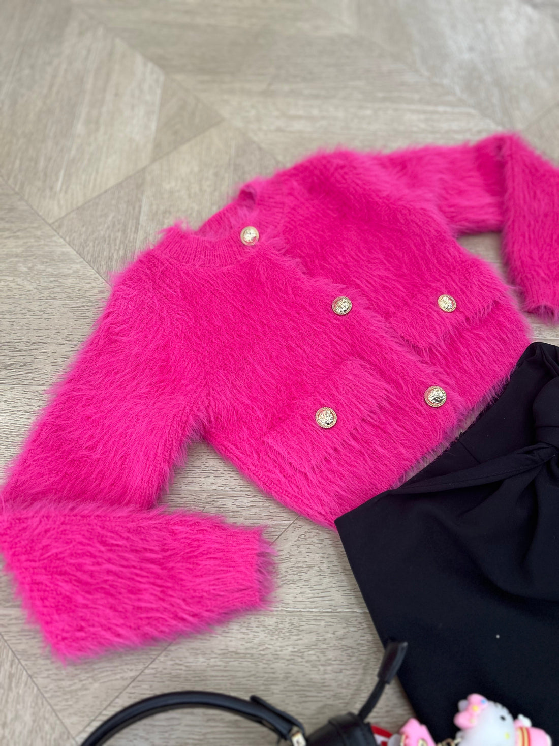 Cardigan peluche fuxia